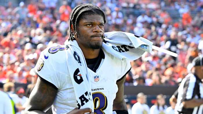 Lamar Jackson walks on the sideline during Sunday’s win against Cleveland.